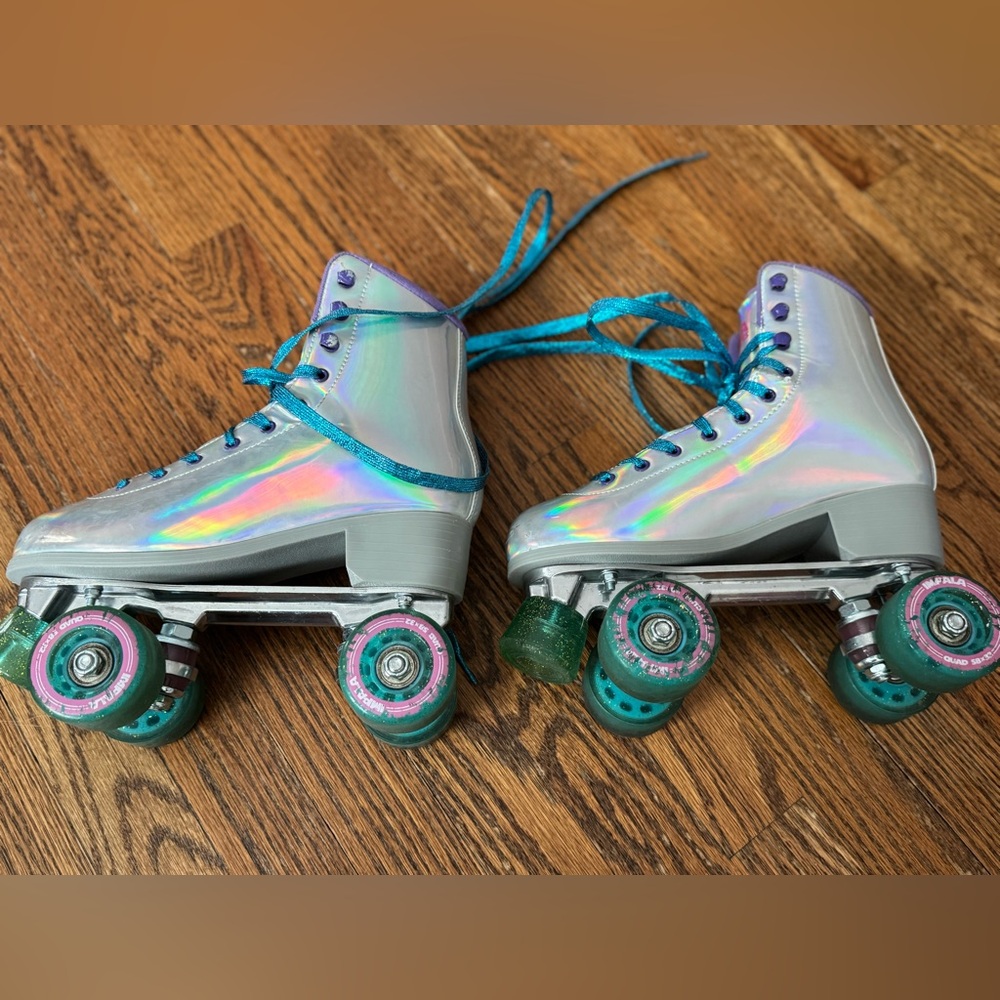 Impala Holographic Roller Skates w/never used knee, elbow and wrist pads.